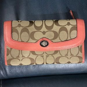 Coach tan and coral trifold wallet